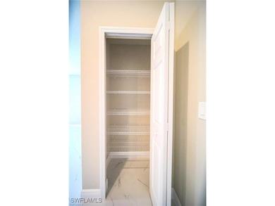 Discover the exceptional quality of this BRAND NEW CONSTRUCTION on Mirror Lakes Golf Club in Florida - for sale on GolfHomes.com, golf home, golf lot