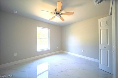 Discover the exceptional quality of this BRAND NEW CONSTRUCTION on Mirror Lakes Golf Club in Florida - for sale on GolfHomes.com, golf home, golf lot