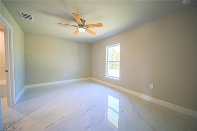 Discover the exceptional quality of this BRAND NEW CONSTRUCTION on Mirror Lakes Golf Club in Florida - for sale on GolfHomes.com, golf home, golf lot