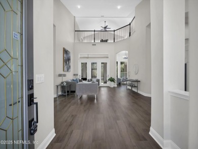 Experience the pinnacle of luxury living in this stunning on Golf Club At South Hampton in Florida - for sale on GolfHomes.com, golf home, golf lot