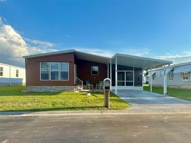 This very affordable two bedroom, two bathroom home is located on Apollo Beach Golf and Sea Club in Florida - for sale on GolfHomes.com, golf home, golf lot