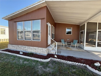 This very affordable two bedroom, two bathroom home is located on Apollo Beach Golf and Sea Club in Florida - for sale on GolfHomes.com, golf home, golf lot