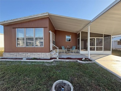 This very affordable two bedroom, two bathroom home is located on Apollo Beach Golf and Sea Club in Florida - for sale on GolfHomes.com, golf home, golf lot