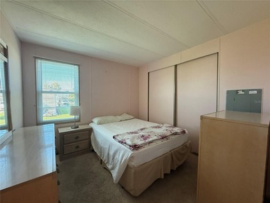 This very affordable two bedroom, two bathroom home is located on Apollo Beach Golf and Sea Club in Florida - for sale on GolfHomes.com, golf home, golf lot