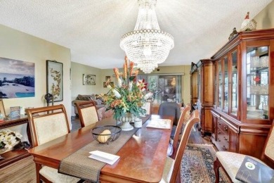 Discover this beautifully upgraded 2nd-floor corner unit in the on Flamingo Lakes Country Club in Florida - for sale on GolfHomes.com, golf home, golf lot