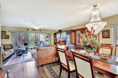Discover this beautifully upgraded 2nd-floor corner unit in the on Flamingo Lakes Country Club in Florida - for sale on GolfHomes.com, golf home, golf lot