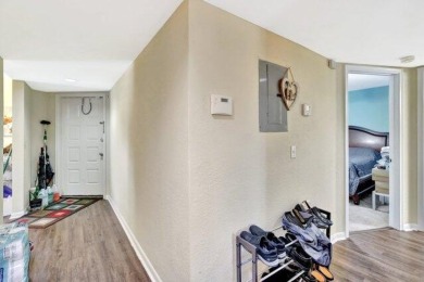 Discover this beautifully upgraded 2nd-floor corner unit in the on Flamingo Lakes Country Club in Florida - for sale on GolfHomes.com, golf home, golf lot