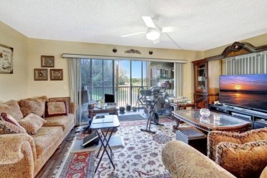 Discover this beautifully upgraded 2nd-floor corner unit in the on Flamingo Lakes Country Club in Florida - for sale on GolfHomes.com, golf home, golf lot