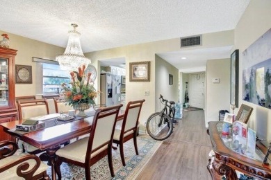 Discover this beautifully upgraded 2nd-floor corner unit in the on Flamingo Lakes Country Club in Florida - for sale on GolfHomes.com, golf home, golf lot