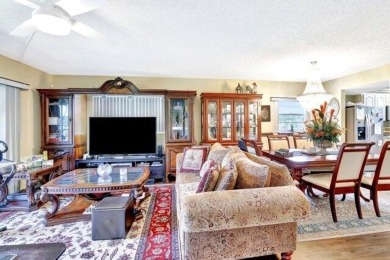Discover this beautifully upgraded 2nd-floor corner unit in the on Flamingo Lakes Country Club in Florida - for sale on GolfHomes.com, golf home, golf lot