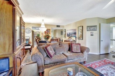 Discover this beautifully upgraded 2nd-floor corner unit in the on Flamingo Lakes Country Club in Florida - for sale on GolfHomes.com, golf home, golf lot