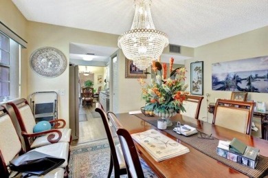 Discover this beautifully upgraded 2nd-floor corner unit in the on Flamingo Lakes Country Club in Florida - for sale on GolfHomes.com, golf home, golf lot