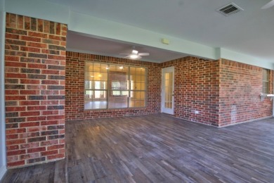 This exceptionally-updated 3 bedroom, 3 bathroom brick home in on Cedar Creek Country Club in Texas - for sale on GolfHomes.com, golf home, golf lot
