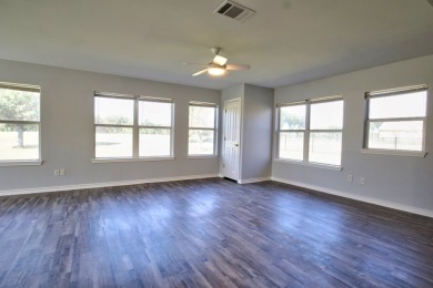 This exceptionally-updated 3 bedroom, 3 bathroom brick home in on Cedar Creek Country Club in Texas - for sale on GolfHomes.com, golf home, golf lot