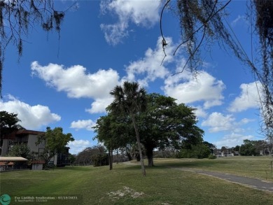 SPACIOUS UPGRADED 3 BEDROOMS, 2 BATHROOMS FIRST FLOOR FALLS OF on Inverrary Country Club in Florida - for sale on GolfHomes.com, golf home, golf lot