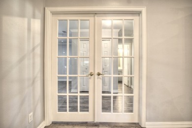 This exceptionally-updated 3 bedroom, 3 bathroom brick home in on Cedar Creek Country Club in Texas - for sale on GolfHomes.com, golf home, golf lot