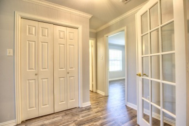 This exceptionally-updated 3 bedroom, 3 bathroom brick home in on Cedar Creek Country Club in Texas - for sale on GolfHomes.com, golf home, golf lot