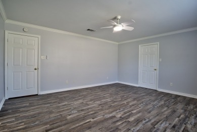 This exceptionally-updated 3 bedroom, 3 bathroom brick home in on Cedar Creek Country Club in Texas - for sale on GolfHomes.com, golf home, golf lot