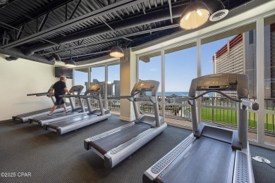 Gulf-view unit featuring new LVP flooring and a barn door for a on Signal Hill Golf Course, Inc. in Florida - for sale on GolfHomes.com, golf home, golf lot