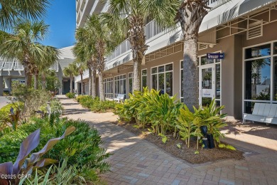 Gulf-view unit featuring new LVP flooring and a barn door for a on Signal Hill Golf Course, Inc. in Florida - for sale on GolfHomes.com, golf home, golf lot