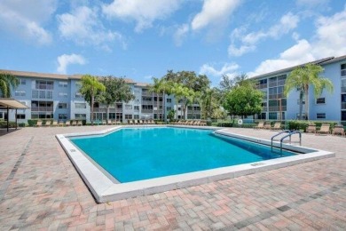 Discover this beautifully upgraded 2nd-floor corner unit in the on Flamingo Lakes Country Club in Florida - for sale on GolfHomes.com, golf home, golf lot