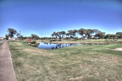 This exceptionally-updated 3 bedroom, 3 bathroom brick home in on Cedar Creek Country Club in Texas - for sale on GolfHomes.com, golf home, golf lot