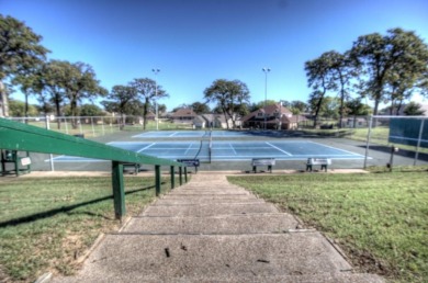 This exceptionally-updated 3 bedroom, 3 bathroom brick home in on Cedar Creek Country Club in Texas - for sale on GolfHomes.com, golf home, golf lot