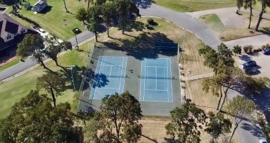 This exceptionally-updated 3 bedroom, 3 bathroom brick home in on Cedar Creek Country Club in Texas - for sale on GolfHomes.com, golf home, golf lot