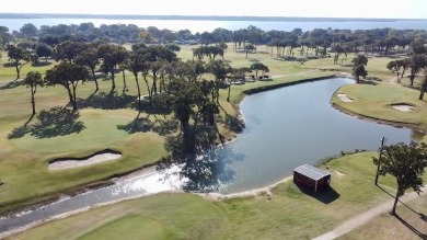 This exceptionally-updated 3 bedroom, 3 bathroom brick home in on Cedar Creek Country Club in Texas - for sale on GolfHomes.com, golf home, golf lot