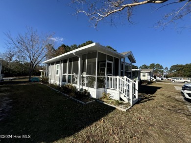 This gorgeous. 2022 Canterbury 38 CKL-SI Park Model is waiting on Star Hill Golf Club  in North Carolina - for sale on GolfHomes.com, golf home, golf lot