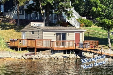 Where do you find a remodeled 2800 s.f. Waterfront Home, 1450 s on The Club At Porto Cima in Missouri - for sale on GolfHomes.com, golf home, golf lot