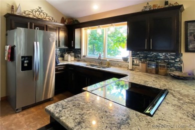 Where do you find a remodeled 2800 s.f. Waterfront Home, 1450 s on The Club At Porto Cima in Missouri - for sale on GolfHomes.com, golf home, golf lot