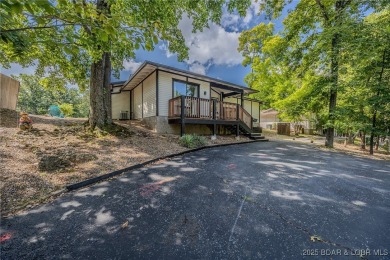 Charming, Fully Updated Home in Tan-Tar-A Estates -Just Minutes on The Oaks Golf Course in Missouri - for sale on GolfHomes.com, golf home, golf lot