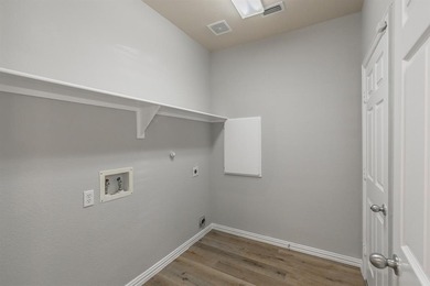 Discover this beautifully updated two-story brick home in the on Woodbridge Golf Club in Texas - for sale on GolfHomes.com, golf home, golf lot