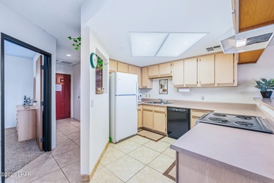 LOCATED IN THE LUXURIOUS QUEENS BAY RESORT! This beautifully on London Bridge Golf Course in Arizona - for sale on GolfHomes.com, golf home, golf lot