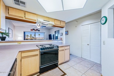 LOCATED IN THE LUXURIOUS QUEENS BAY RESORT! This beautifully on London Bridge Golf Course in Arizona - for sale on GolfHomes.com, golf home, golf lot