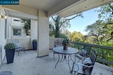 Nestled at the end of the drive, this rare end-unit level-in on Rossmoor Golf Course in California - for sale on GolfHomes.com, golf home, golf lot