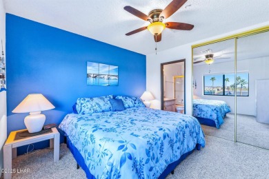 LOCATED IN THE LUXURIOUS QUEENS BAY RESORT! This beautifully on London Bridge Golf Course in Arizona - for sale on GolfHomes.com, golf home, golf lot