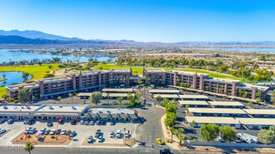 LOCATED IN THE LUXURIOUS QUEENS BAY RESORT! This beautifully on London Bridge Golf Course in Arizona - for sale on GolfHomes.com, golf home, golf lot