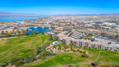 LOCATED IN THE LUXURIOUS QUEENS BAY RESORT! This beautifully on London Bridge Golf Course in Arizona - for sale on GolfHomes.com, golf home, golf lot