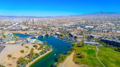 LOCATED IN THE LUXURIOUS QUEENS BAY RESORT! This beautifully on London Bridge Golf Course in Arizona - for sale on GolfHomes.com, golf home, golf lot