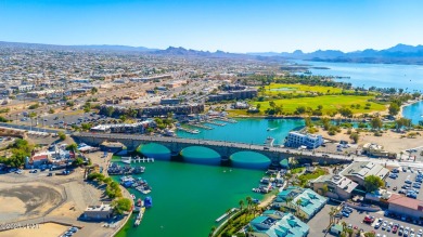 LOCATED IN THE LUXURIOUS QUEENS BAY RESORT! This beautifully on London Bridge Golf Course in Arizona - for sale on GolfHomes.com, golf home, golf lot