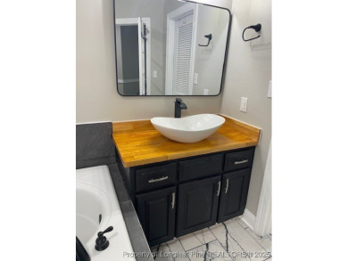 Welcome to this charming home in the highly sought-after golf on Baywood Golf Club in North Carolina - for sale on GolfHomes.com, golf home, golf lot