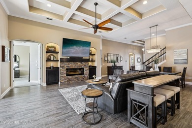 Stunning pool home with a pond to golf course view in gated on Magnolia Point Golf and Country Club in Florida - for sale on GolfHomes.com, golf home, golf lot