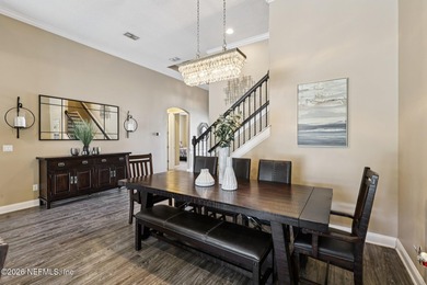 Stunning pool home with a pond to golf course view in gated on Magnolia Point Golf and Country Club in Florida - for sale on GolfHomes.com, golf home, golf lot