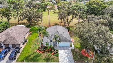 Welcome home to this picture-perfect 3-bedroom, 2-bathroom gem on Meadow Oaks Golf and Country Club in Florida - for sale on GolfHomes.com, golf home, golf lot