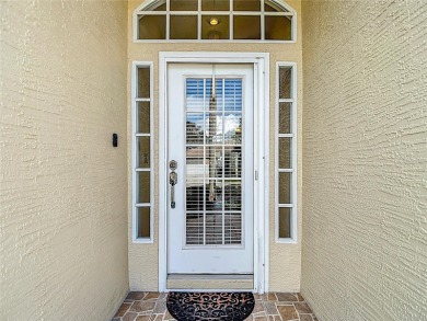 Welcome home to this picture-perfect 3-bedroom, 2-bathroom gem on Meadow Oaks Golf and Country Club in Florida - for sale on GolfHomes.com, golf home, golf lot