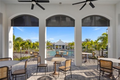 This beautiful Triumph model home by Neal Homes is in Waterside on The Founders Golf Club in Florida - for sale on GolfHomes.com, golf home, golf lot