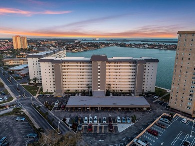 Welcome to waterfront living at its finest in Point Brittany; on Isla Del Sol Yacht and Country Club in Florida - for sale on GolfHomes.com, golf home, golf lot