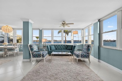 Welcome to waterfront living at its finest in Point Brittany; on Isla Del Sol Yacht and Country Club in Florida - for sale on GolfHomes.com, golf home, golf lot